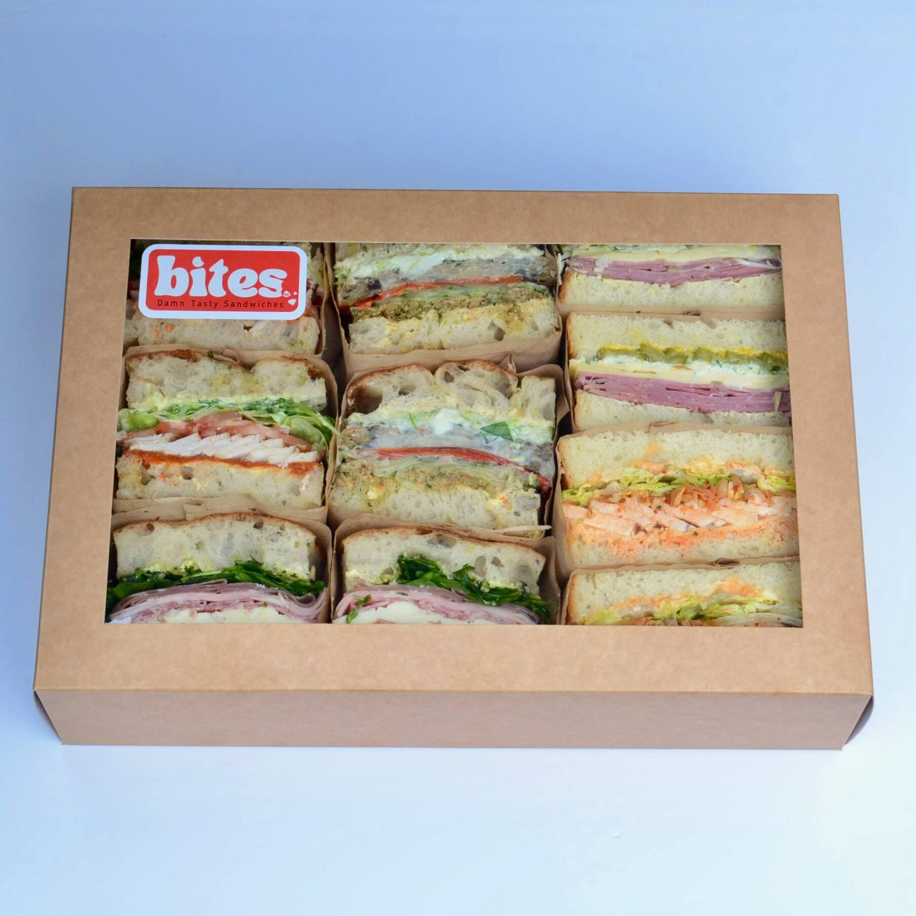 Catering box full of Bites sandwiches